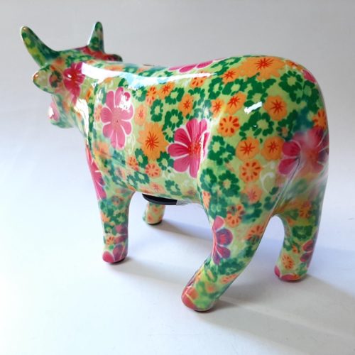 Spaarpot koe in groen met bloemenprint