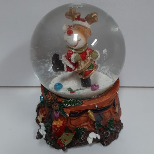 Sneeuwbol muziek rendier met kerstman pak en trommel