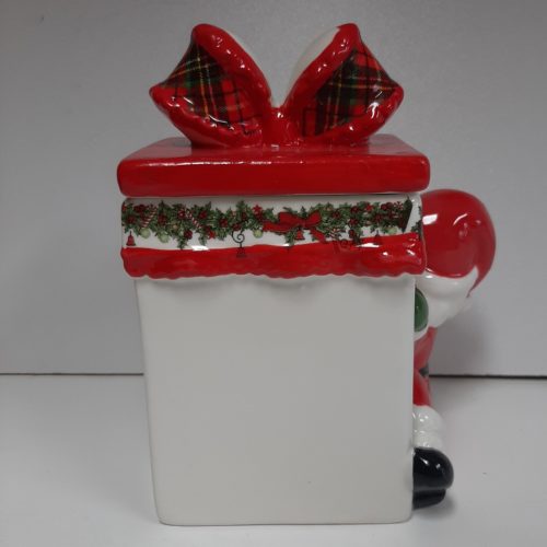 Voorraad pot kerst-kerstman met cadeau